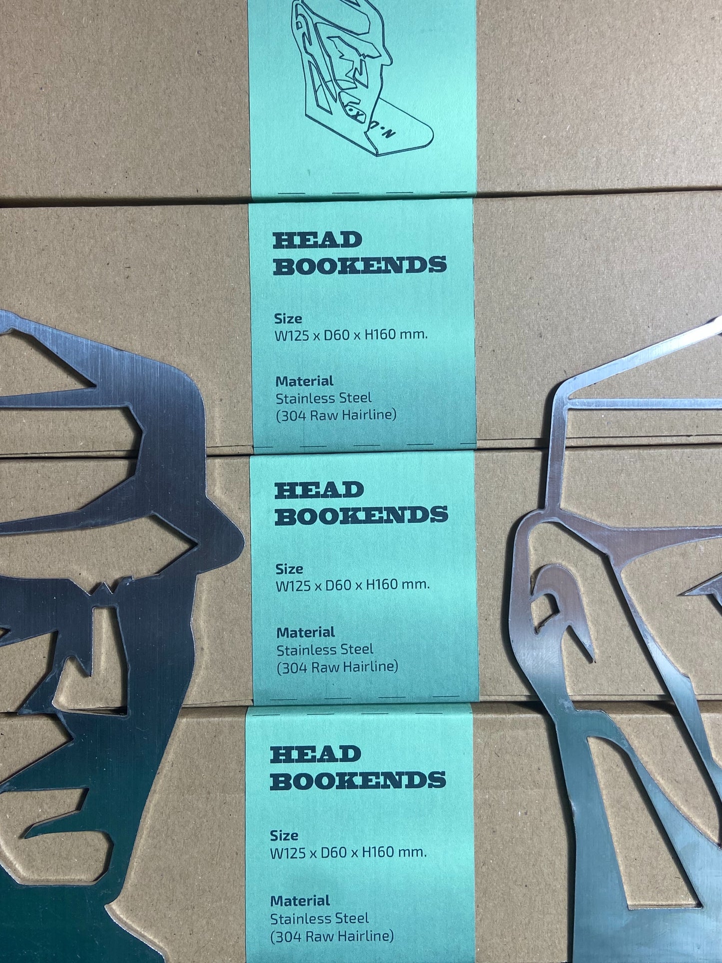 N.U.X.K - HEAD BOOKENDS
